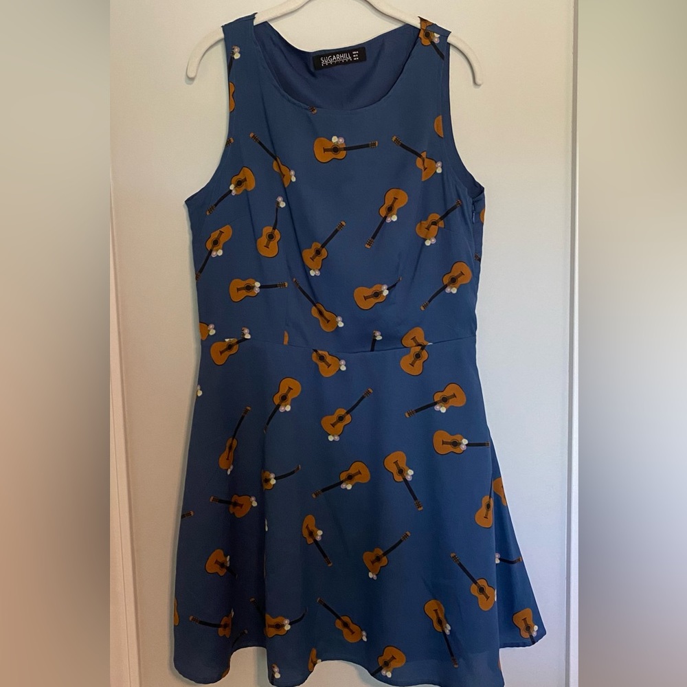 Sugarhill Fit and flare guitar printed dress